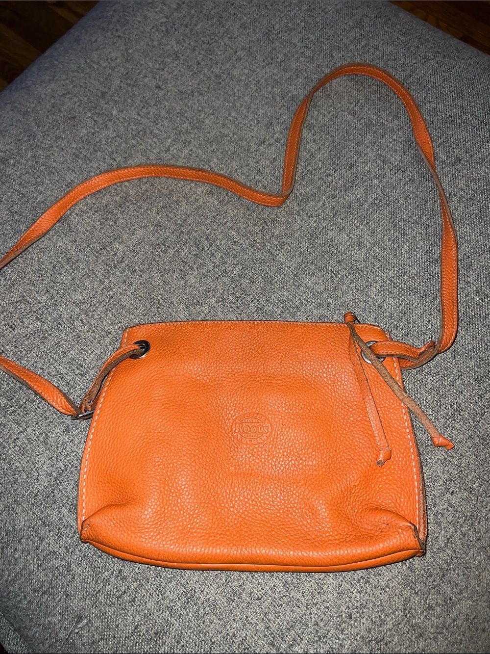 Roots Orange Pebbled Leather Crossbody Bag